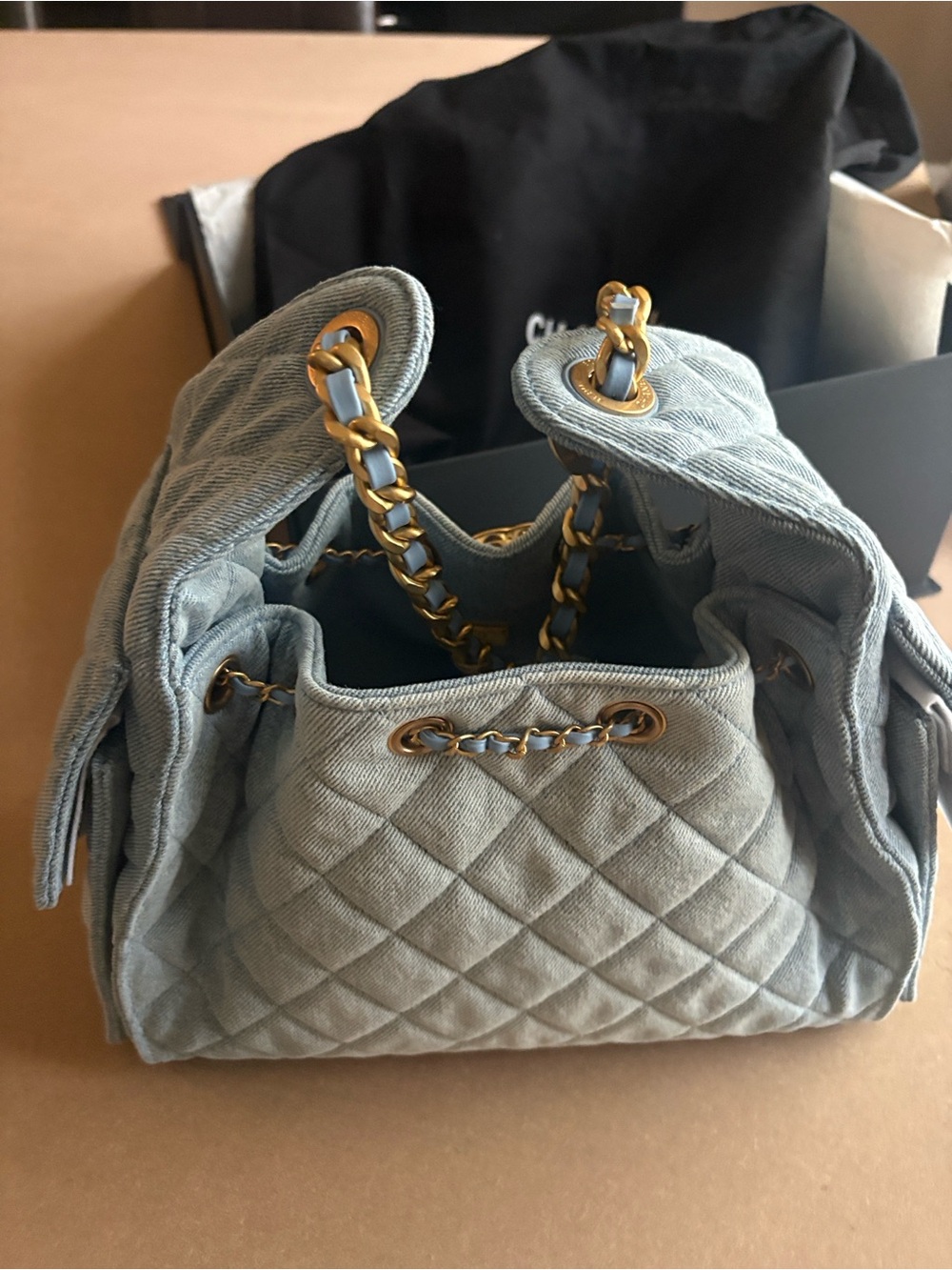 CHANEL 25 Drawstring Shoulder Bag in Denim with Gold Hardware - Picture 4 of 5